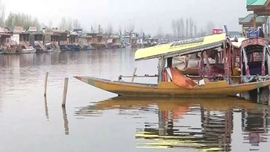 India News | J-K: Tourists Enjoy Chilly Morning at Dal Lake in Srinagar