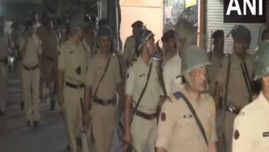 India News | Nagpur: Police Conduct Flag March in the Violence-hit Area to Instil Confidence Among People