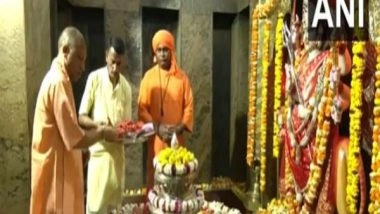 India News | UP: CM Yogi Offers Prayers at Pateshwari Devi Temple, Feeds Cows at Gaushala in Balrampur