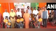 India News | CM Adityanath Distributes Motorised Tricycles to Differently-abled Persons in Gorakhpur