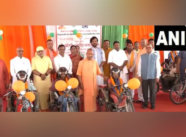 India News | CM Adityanath Distributes Motorised Tricycles to Differently-abled Persons in Gorakhpur