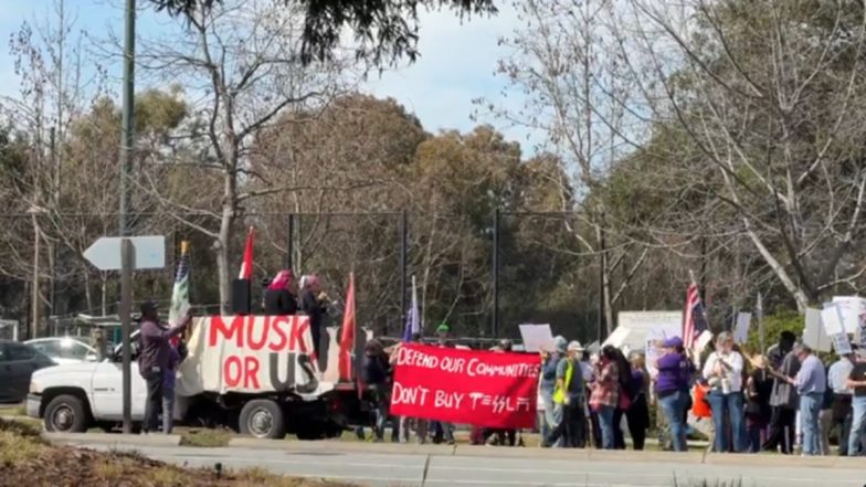 ‘We Can Get Back at Elon Musk’: Anti-DOGE Protests at Tesla Stores Target Automaker’s Billionaire CEO’s Bottom Line (Watch Videos)