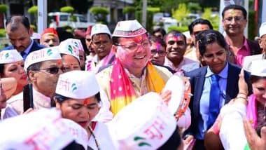 Holi 2025: Cultural Richness and Unity of Uttarakhand on Display As CM Pushkar Singh Dhami Plays Holi With Folk Artists at Holi Milan Programme