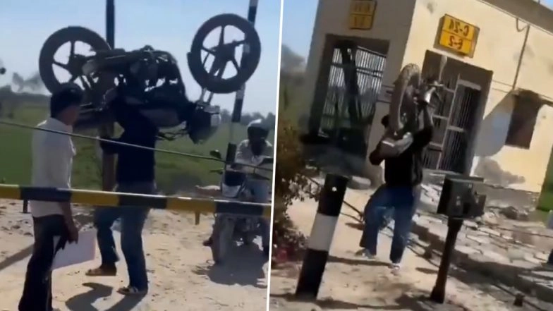 ‘Indian Ironman’: Man Lifts Bike Onto His Shoulders To Cross Railway Barrier, Video Goes Viral