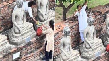 Woman Tourist Climbs Atop Buddha Statue Inside Thai Temple To Pluck Mangoes, Viral Video Sparks Outrage