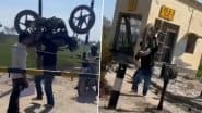 Man Casually Lifts Bike on His Shoukders To Cross Railway Barrie, Viral Video Will Leave You in Shock!