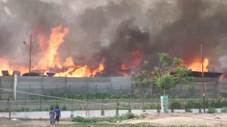 Prayagraj Fire: Firefighters Battle As Massive Blaze Erupts at Tent House Godown in Uttar Pradesh (Watch Videos)