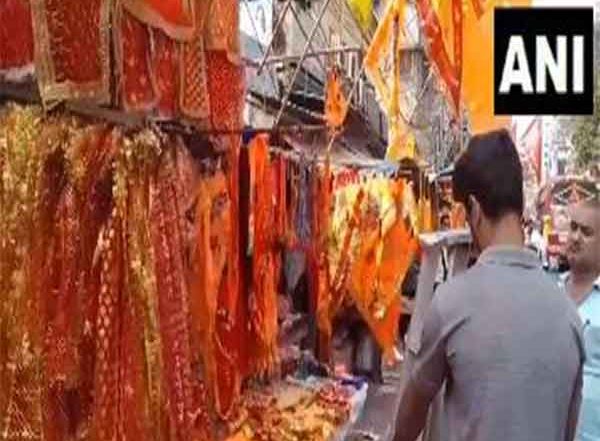 India News | WBengal: Markets and Shops Deck Up with Flags and Posters in Howrah Ahead of Ram Navami