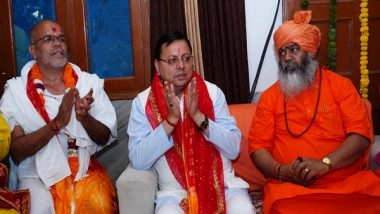 India News | Uttarakhand CM Pushkar Singh Dhami Recites Sunderkand Paath During Event in Dehradun