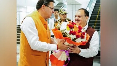 India News | Uttarakhand CM Pushkar Dhami Welcomes Union Minister JP Nadda at Dehradun's Jolly Grant Airport