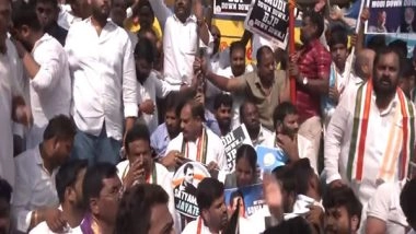 India News | Political Showdown over ED Chargesheet Against Gandhis: Congress Holds Nationwide Protests, BJP Hits Back at Financial Misconduct