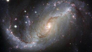 World News |  Astronomers Find Planet in Perpendicular Orbit Around Pair of Stars: Study