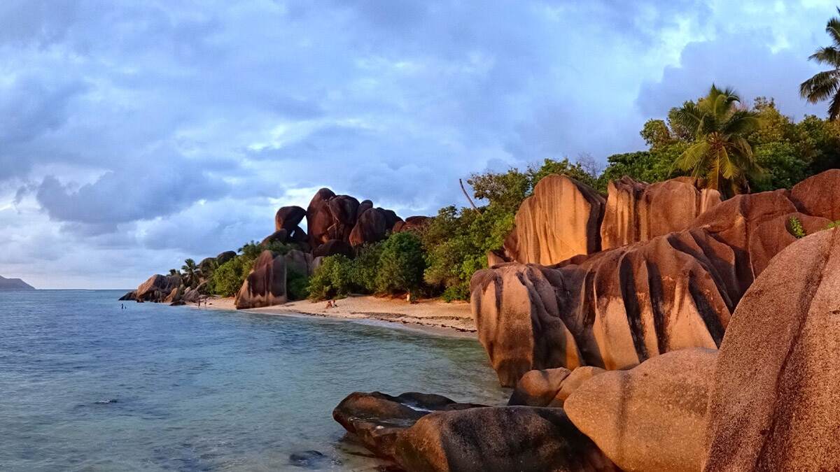 One of the most photographed beaches in the world with pink sands and towering granite rocks. One of the most photographed beaches in the world with pink sands and towering granite rocks.