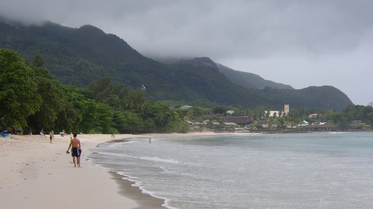 A popular beach for water sports, sunsets, and vibrant local life. A popular beach for water sports, sunsets, and vibrant local life.