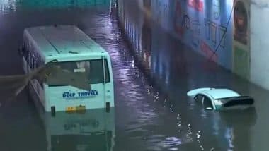 Delhi Rains: Car and Bus Submerged in Waterlogged Roads Near Delhi Cantt After Heavy Downpour in National Capital (Watch Video)