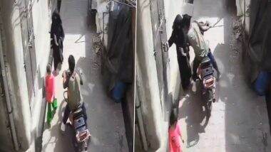 Harassment Caught on Camera in Meerut: Bike-Borne Man Kisses Burqa-Clad Woman Without Consent and Flees, Disturbing Video Surfaces