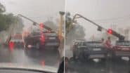 Noida: Vehicle Crushed As Traffic Light Pole Falls on Car at Sector 27 DM Chowk After Heavy Rainfall(Watch Video)
