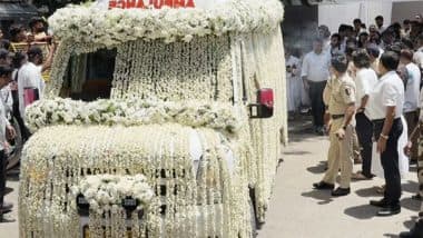 Entertainment News | Nirmal Kapoor's Mortal Remains Taken for Final Rites in Ambulance Decorated with Garlands