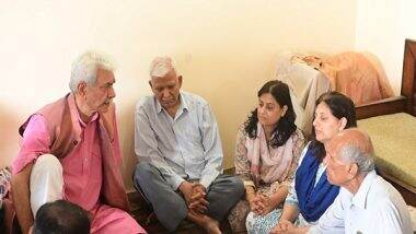 India News | J&K LG Manoj Sinha Meets Family of ADDC Raj Kumar Thapa, Who Died in Cross-border Shelling