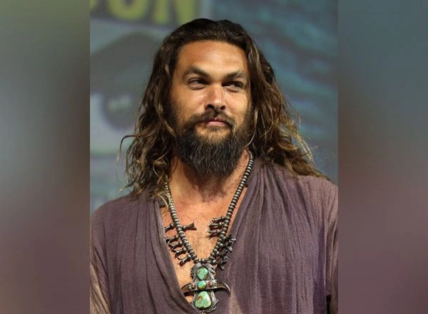 Entertainment News | Cannes: Jason Momoa Walks Red Carpet with Adria Arjona