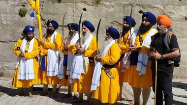 India News | Uttarakhand: Chamoli Police Escort First Group of Sikh Pilgrims for Shri Hemkund Sahib Yatra 2025