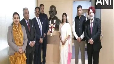World News | Latvia: Kanimozhi-led All-party Delegation Pays Tribute to Mahatma Gandhi Bust at National Library in Riga
