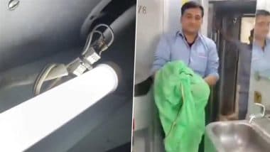 Snake on Train: Panic on Dibrugarh Rajdhani Express As Serpent Found in Toilet, Rescued and Thrown Out of Moving Train by Railway Staff; Video Goes Viral