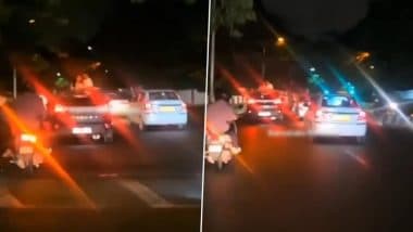 Bengaluru: Couple Filmed Kissing Through Sunroof of Moving Car on Trinity Road, Video Goes Viral
