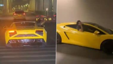 Dangerous Stunts Caught on Camera in Gurugram: Man Seen Racing INR 6 Crore Lamborghini on Golf Course Road, Hanging Out of Window and Making Obscene Gestures; Police Launch Probe As Video Goes Viral