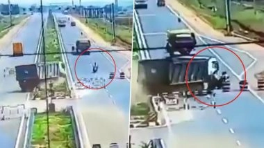 Andhra Pradesh Road Accident: Drunk Lorry Driver Jumps Divider, Rams 2-Wheeler Before Veering Off Road in Nandikotkur; CCTV Video Surfaces