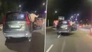 Stunt Caught on Camera in Lucknow: Man Performs Dangerous Act from Moving Scorpio Near UP CM’s Residence; Accused Arrested As Assembly Pass on Vehicle Sparks Security Concerns (Watch Video)