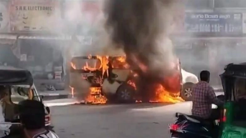 Tirupati Car Fire: Narrow Escape for 6 Passengers As Moving Vehicle Bursts Into Flames Near Padmavathi Puram in Andhra Pradesh (Watch Video)