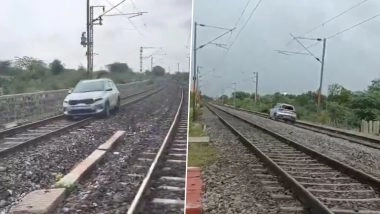 Drunk Woman Drives Car on Railway Track Near Hyderabad, Train Traffic Disrupted (Watch Bizarre Videos)