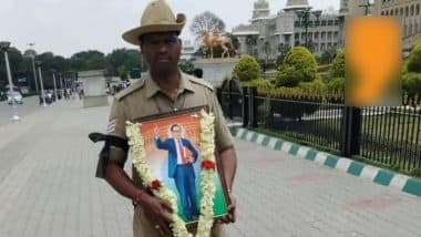 Bengaluru Stampede: Head Constable Walks to Raj Bhavan With Black Armband and Ambedkar Portrait To Protest Suspension of Police Commissioner B Dayanand After Chinnaswamy Stadium Tragedy, Pic Surfaces