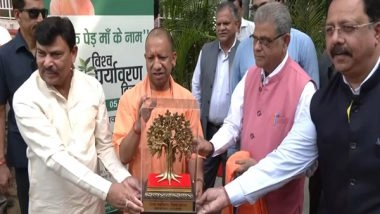 India News | Lucknow: CM Yogi Adityanath Plants Sapling, Wishes Ganga Dussehra, World Environment Day