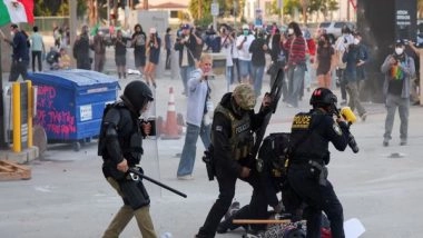 World News | Protests in LA Intensify over Federal Immigration Sweeps, Tear Gas Used