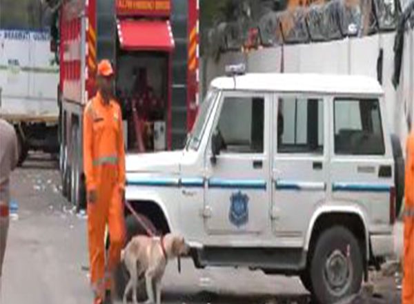 India News | NDRF Personnel Return to AI-171 Crash Site with Sniffer Dogs in Search of Survivors