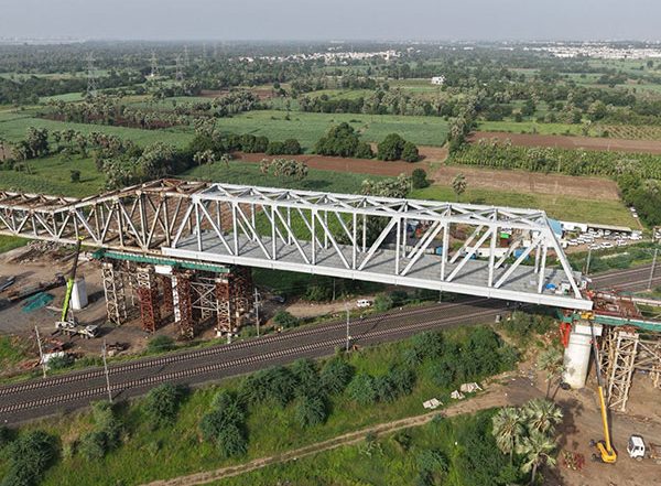 India News | 100 M-long 'Make in India' Steel Bridge Launched over DFC Tracks for Mumbai-Ahmedabad Bullet Train Project