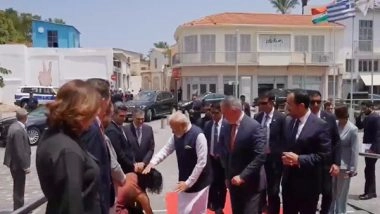 World News | Council Member Greets PM Modi in Customary Indian Way in Cyprus