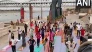 India News | Uttar Pradesh: People Perform Yoga at Namo Ghat Ahead of International Yoga Day