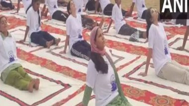 India News | Indian Army Organises Yoga Session for Locals in J-K's Akhnoor Ahead of Int'l Yoga Day
