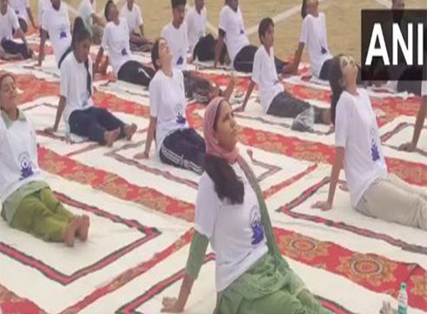 India News | Indian Army Organises Yoga Session for Locals in J-K's Akhnoor Ahead of Int'l Yoga Day