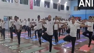 India News | Defence Minister Rajnath Singh Takes Part in International Yoga Day Celebrations in Udhampur, Hails Indian Army and Op Sindoor