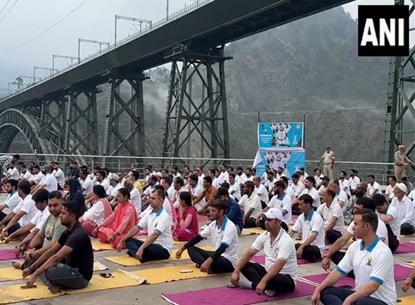 India News | J-K: Yoga Session Held at Chenab Rail Bridge, World's Highest Railway Bridge, in Reasi