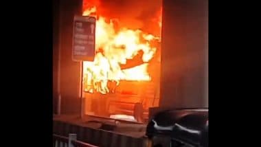 Mumbai Bus Fire: Private Bus Catches Blaze Under Devipada Metro Station in Borivali, Videos Show Vehicle Engulfed in Flames and Smoke Covering Station