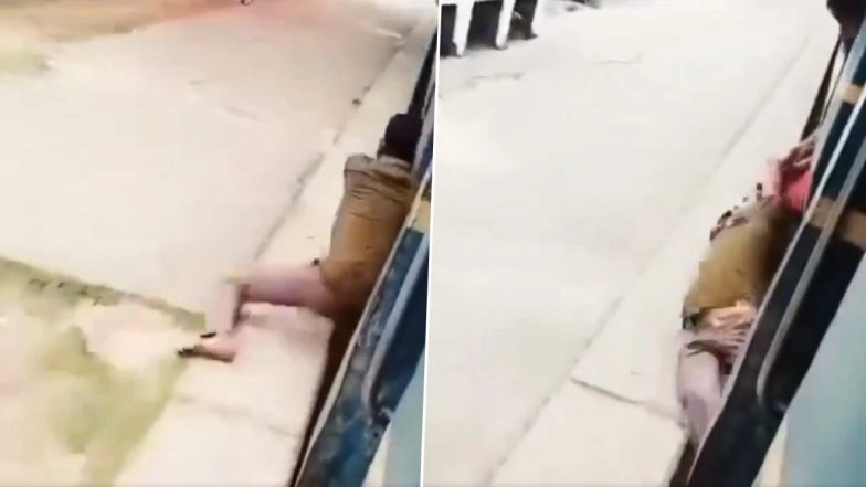 Stunt Gone Wrong: Man Hangs From Train Door, Loses Balance and Gets Dragged Under Moving Train at Station in India; Video Goes Viral