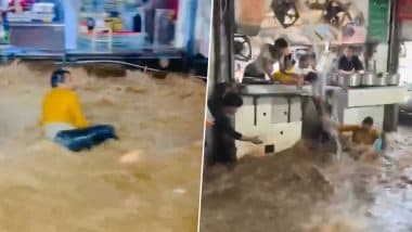 Ajmer Rains: Youth Swept Away by Gushing Rainwater in Khwaja Garib Nawaz Dargah Area, Brave Hotel Worker Rescues Him Amid Flash Flood Chaos; Video Goes Viral