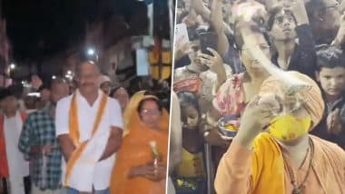 Uttar Pradesh: Devotees Queue Up at Varanasi’s Kashi Vishwanath Dham, Lucknow’s Mankameshwar Temple To Offer Prayers on 1st Monday of ‘Sawan’ (Watch Videos)