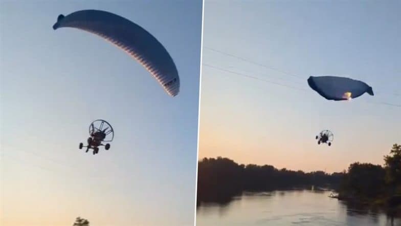 North Dakota: Paraglider Unharmed After Crashing Into Power Line, Falling Into Red River in Grand Forks; Video Surfaces