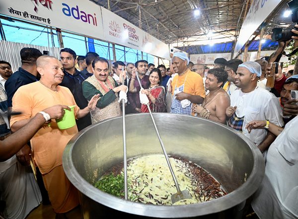 India News | Gautam Adani Visits ISKCON Kitchens in Puri, Joins Volunteers in Act of Service